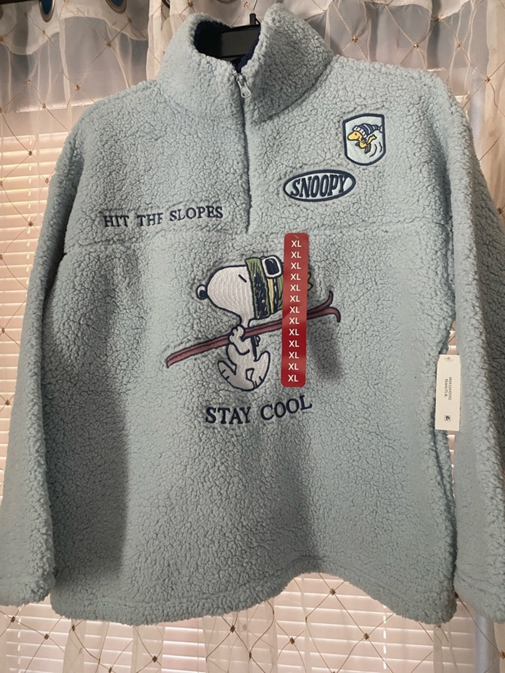 Peanuts Light Blue Sherpa Pullover with Snoopy Ski Graphic